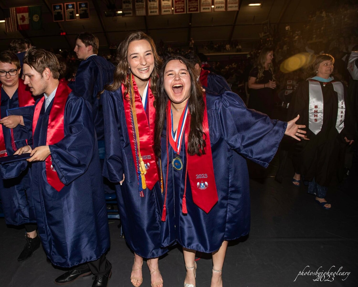 Newly graduated Wolves show their smiles.